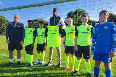 Youngsters at a Telford football club kick off the new season with a new kit after winning support from a mortgage adviser and professional footballer